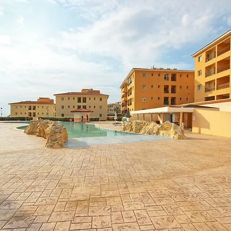Sandy Beach With Swimming Pool And